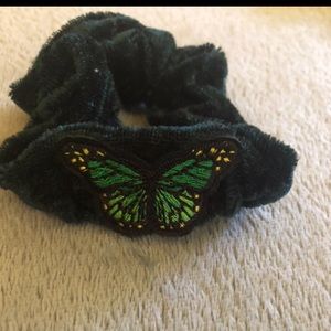 Really dark green with a butterfly